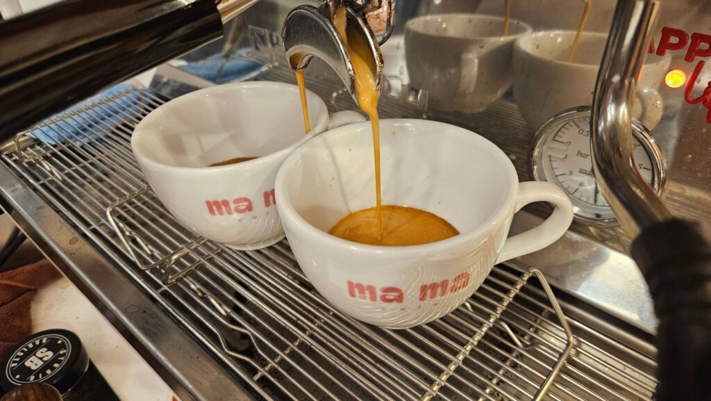 Espresso from a Nuova Simonelli Appia Life into Ma Ma Cafe cups
