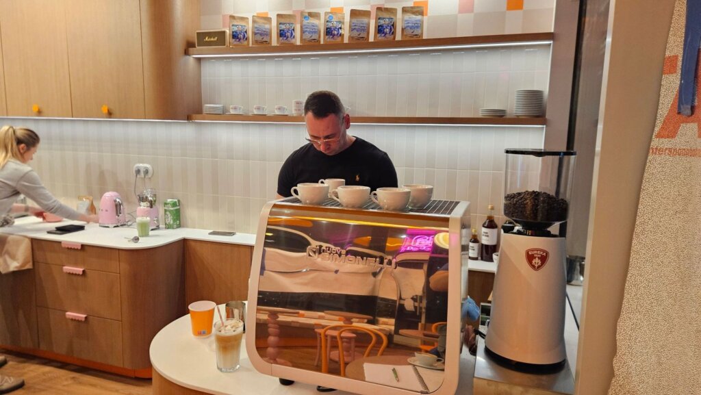 Colbergcoffee specialist at the Nuova Simonelli machine on the launch day of Ma Ma Cafe